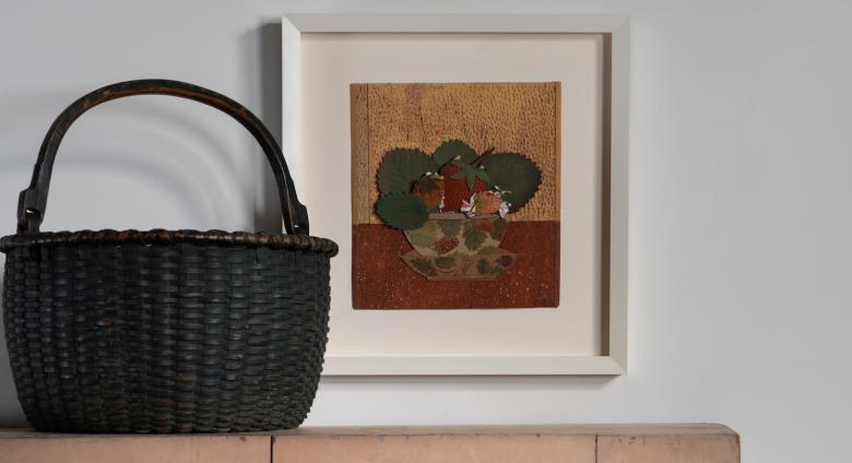 Laurene Krasny Brown, Berry Bowl, 2017. Gouache on cut paper. 10.5 x 9.5 in. Pictured with a 19th century green-painted splint basket atop an antique cupboard in original pink paint