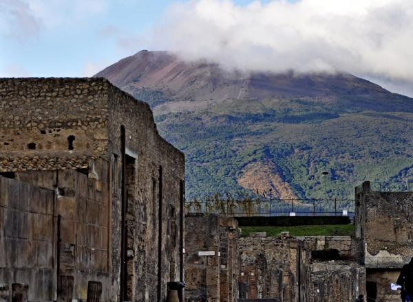 Pompeii excavations with Mount Vesuvius, 2011. License