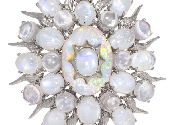 moonstone brooch in the shape of an oval with star points