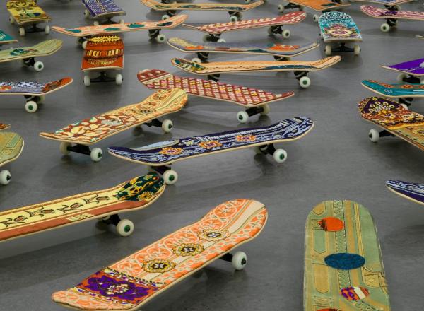 Mounir Fatmi, Maximum Sensation, 2010. Fifty skateboards, plastic, metal, textile, 5 × 8 × 31 11/16 in. (12.7 × 20.3 ×80.5 cm). Brooklyn Museum.